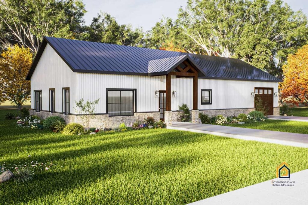 ront and side view of a two-bedroom Cowboy Barndominium featuring white metal siding, a dark metal roof, black trim, and stone wainscoting with colorful landscaping.