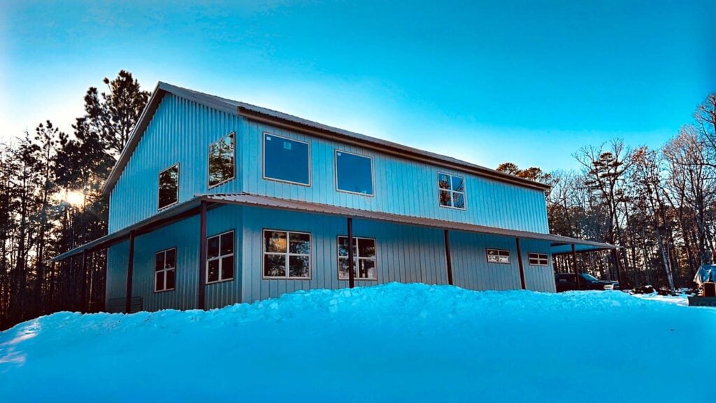 Barndominium in Snow on a Hill