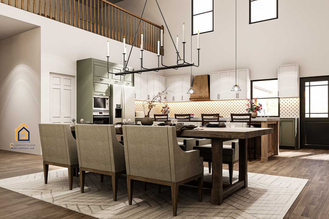 Stylish dining area in the Summit Barndominium with a large wooden table, upholstered chairs, contemporary chandelier, and open views to the kitchen and upper loft.