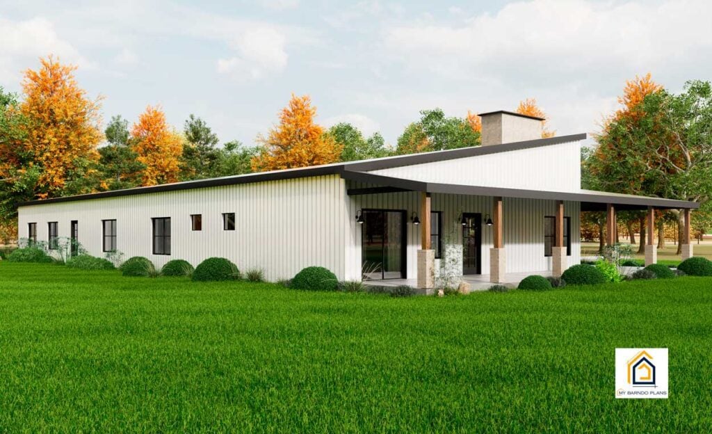 Rear view of The Arcadia barndominium with a covered porch and scenic fall foliage.