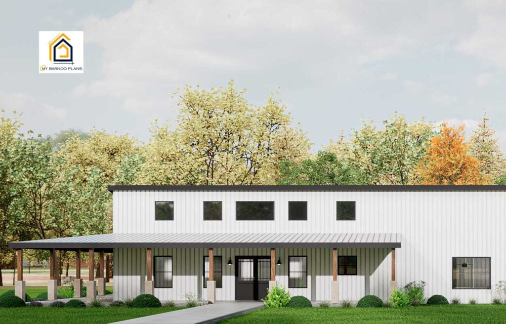Straight-on view of The Arcadia barndominium showing the entry porch, front windows, and elevated roofline.