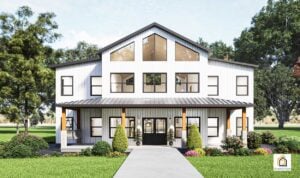 Front view of the Ironwood Barndominium with white vertical metal siding, black windows, and a full width covered porch